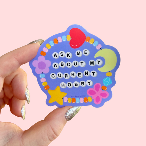 Ask Me About My Current Hobby Sticker - The Peach Fuzz