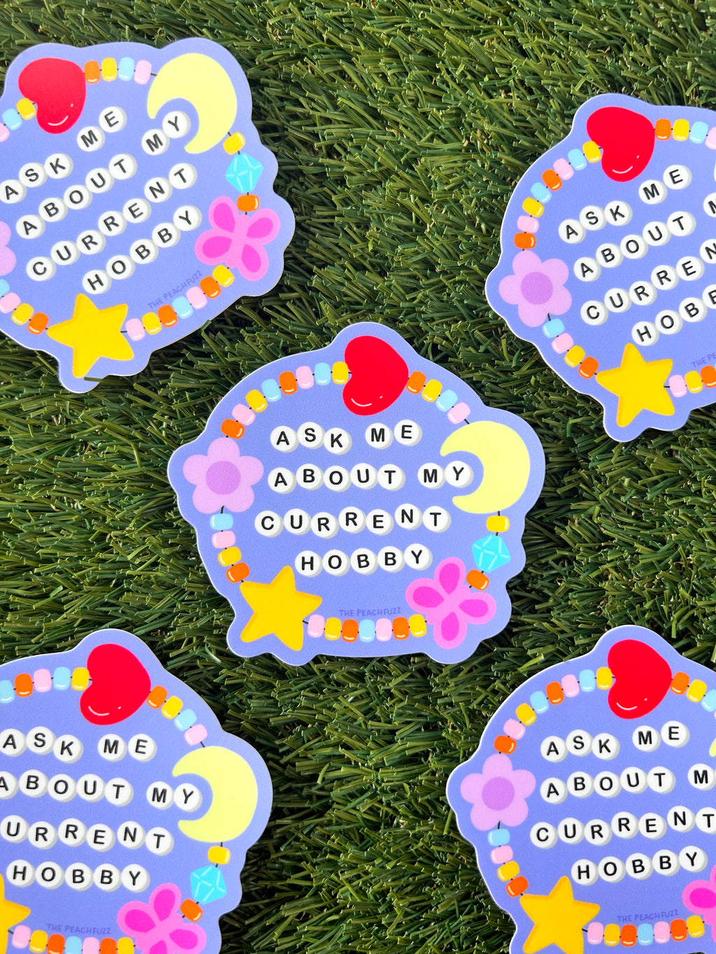Ask Me About My Current Hobby Sticker - The Peach Fuzz