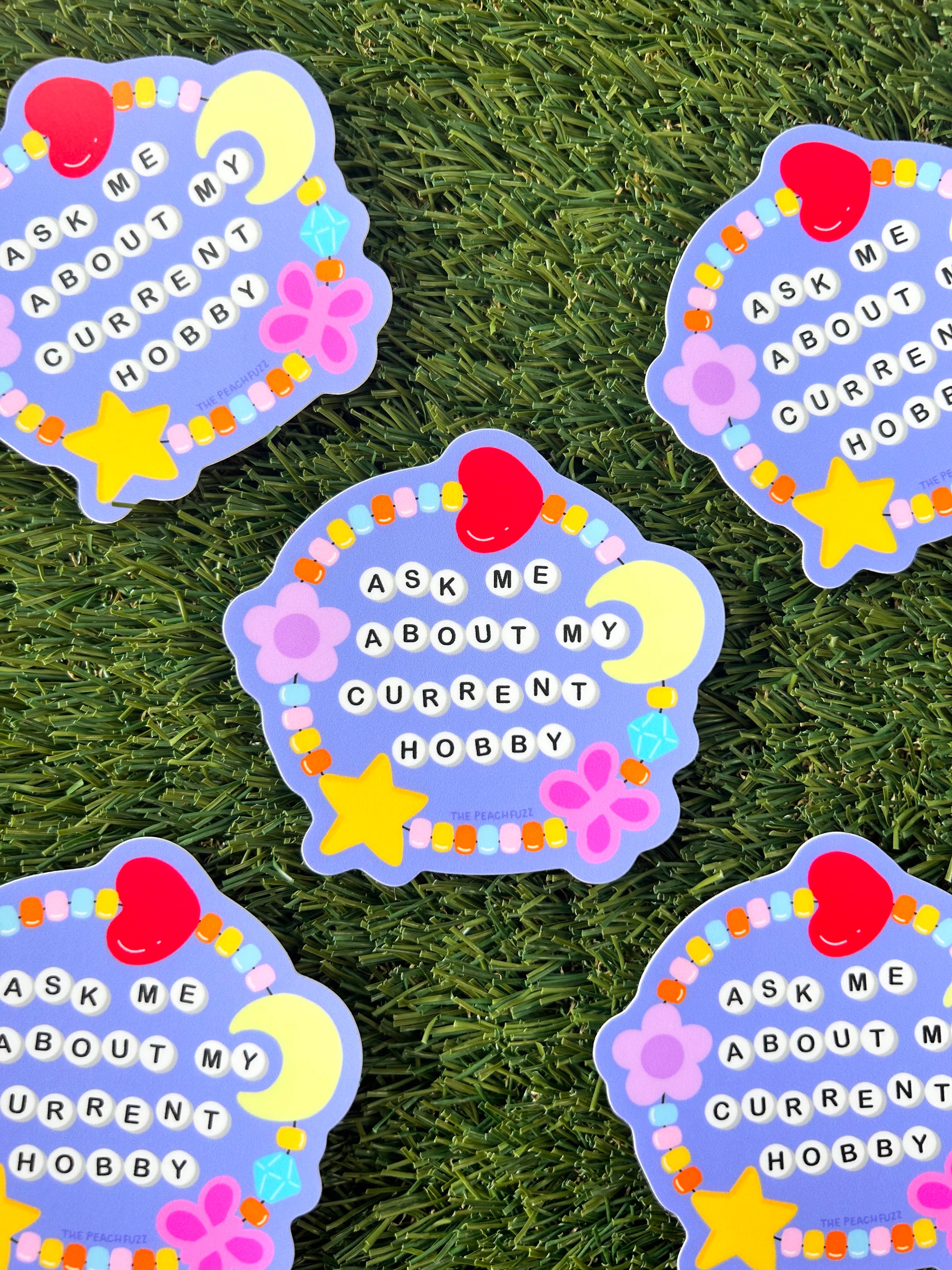 Ask Me About My Current Hobby Sticker - The Peach Fuzz