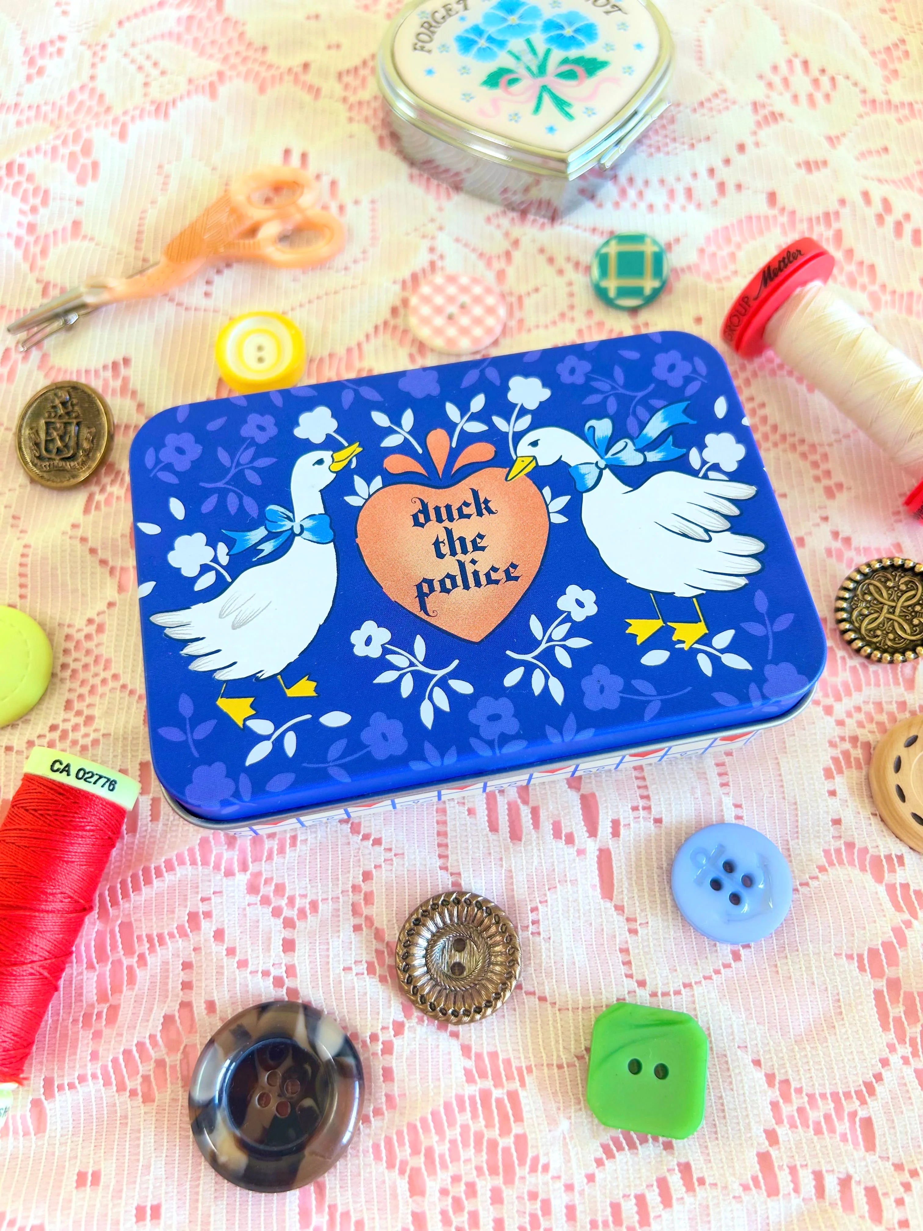 Duck the Police Storage Tin - The Peach Fuzz