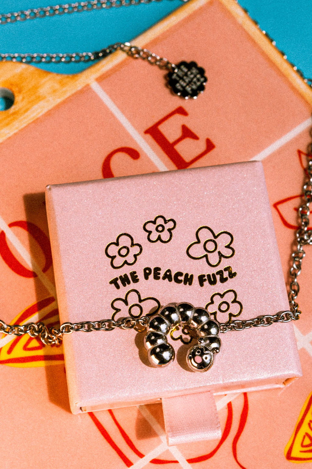 Caterpillar Necklace - The Peach Fuzz