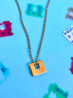 Bread Winner Necklace - The Peach Fuzz